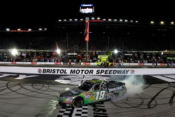 Kyle Busch does a burnout to celebrate his IRWIN Tools Night Race at Bristol Motor Speedway victory, the 19th NASCAR Sprint Cup Series win of his career. Credit: Jason Smith/Getty Images